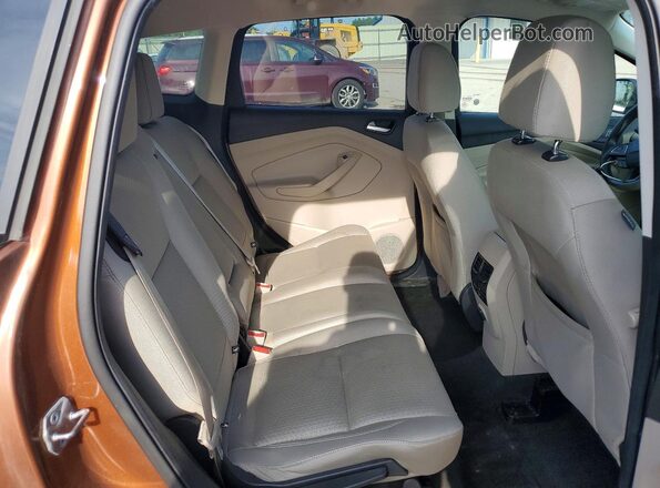 1FMCU9GD5HUF01013 2017 FORD ESCAPE Orange Rear interior view