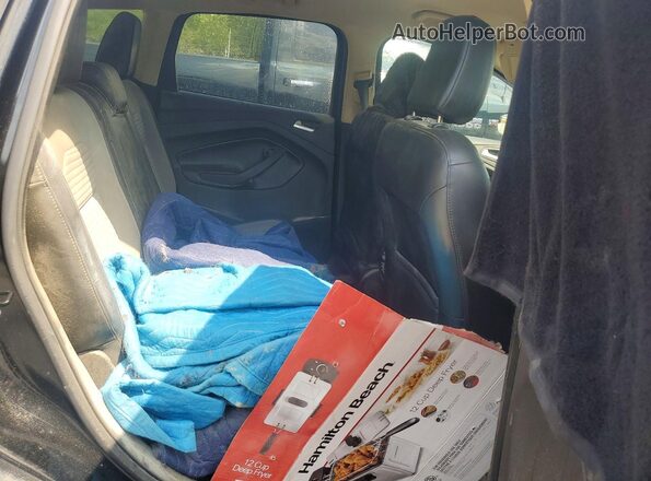 1FMCU9GD8JUD49072 2018 FORD ESCAPE Черный Вид задней части салона