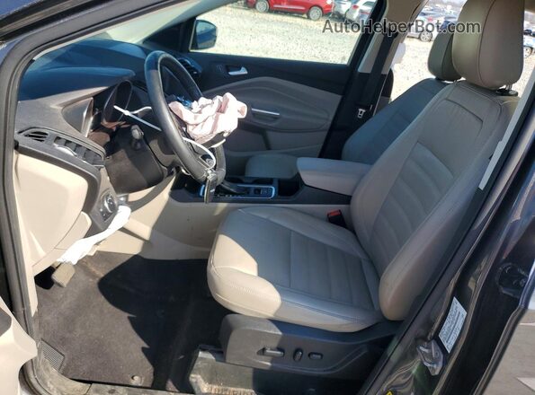 1FMCU9J91KUB94581 2019 FORD ESCAPE Серый Вид салона спереди