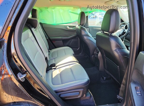 1FMCU9JA5PUB37558 2023 FORD ESCAPE Black Rear interior view