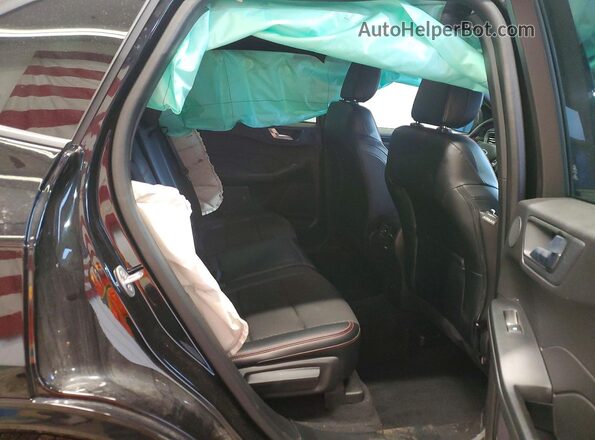 1FMCU9NA7PUB47146 2023 FORD ESCAPE Черный Вид задней части салона