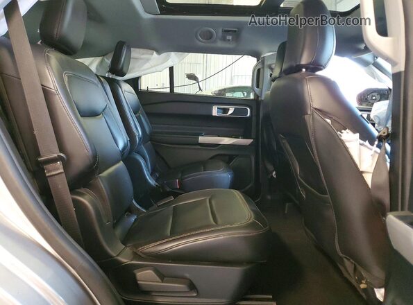 1FMSK8DH2PGB93993 2023 FORD EXPLORER Silver Vista interior trasera