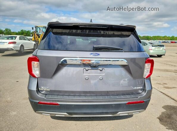 1FMSK8DH7RGA63176 2024 FORD EXPLORER Серый Вид сзади