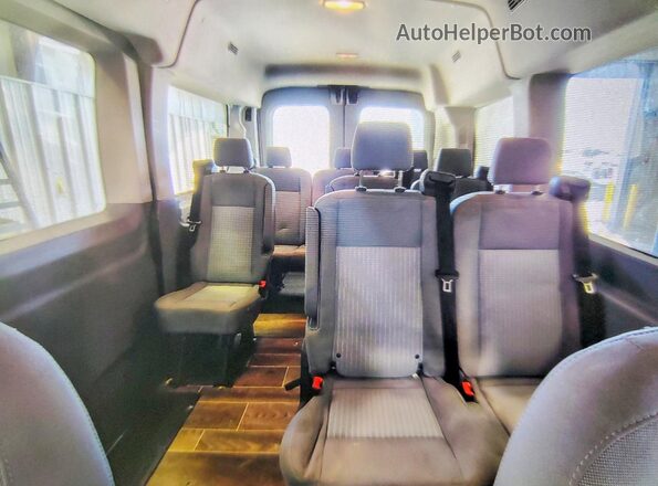 1FMZK1CM2JKA62927 2018 FORD TRANSIT White Vista de los asientos traseros