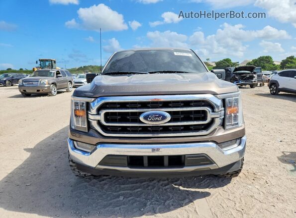1FTEW1CP6MFB23811 2021 FORD F150 Brown Widok z przodu
