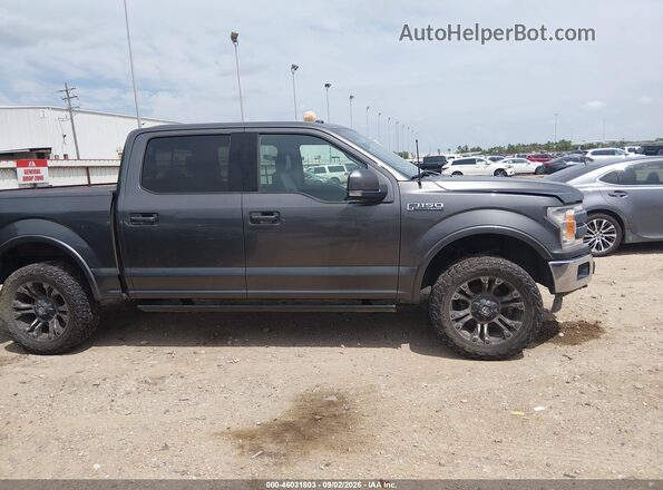 1FTEW1E57JFD54644 2018 FORD F150 Gray Vista interior trasera