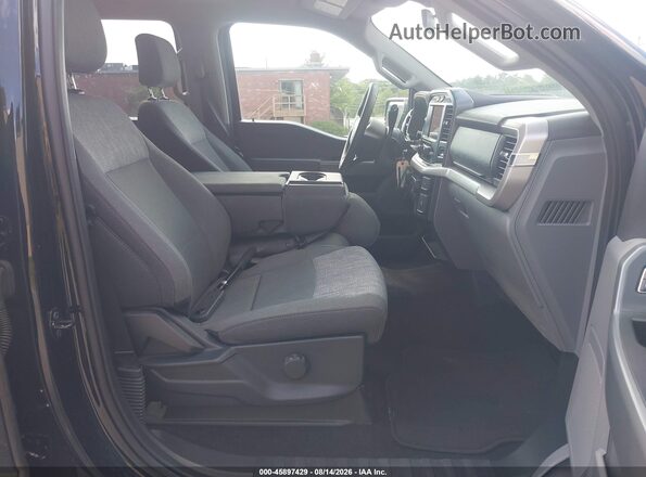 1FTEW1EP4PFA24194 2023 FORD F150 Black Vista interior delantera