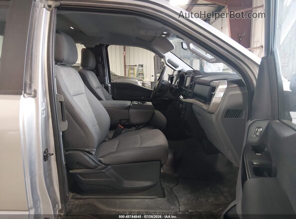 1FTEX1EB9MFB38477 2021 FORD F150 Silver Widok wnętrza z przodu