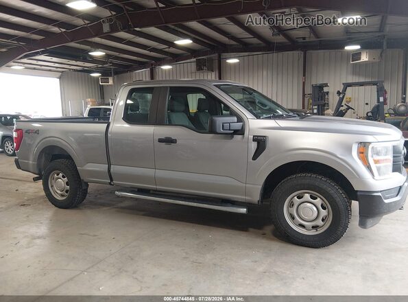 1FTEX1EB9MFB38477 2021 FORD F150 Silver Widok wnętrza z tyłu
