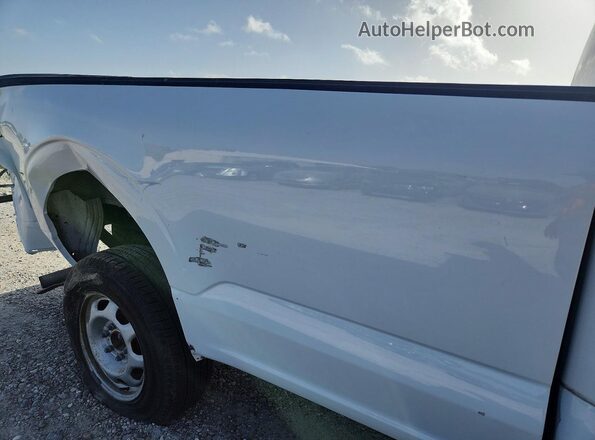 1FTMF1CB7NKD65435 2022 FORD F150 Blue Vista de los asientos traseros