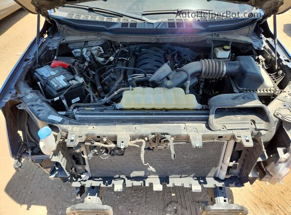 1FTMF1L57RKD30474 2024 FORD F150 Blue Vista interior trasera