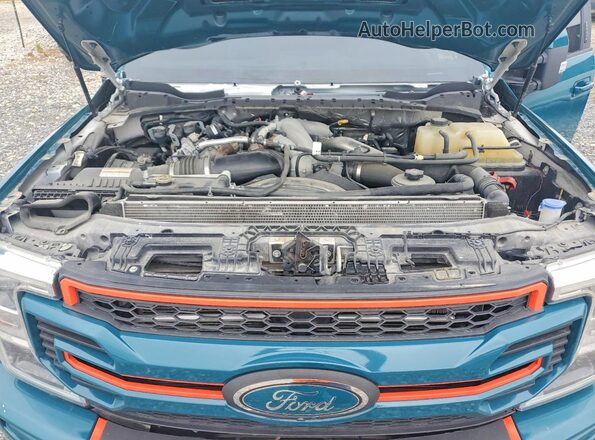 1FTRF3DT4NEC56745 2022 FORD F350 Teal Widok wnętrza z tyłu