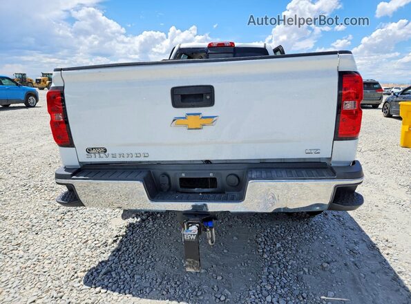 1GC4KXCG0KF190797 2019 CHEVROLET SILVERADO White Widok z tyłu