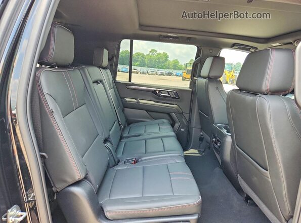 1GNS6EKD0TR242556 2026 CHEVROLET SUBURBAN Black Widok wnętrza z tyłu