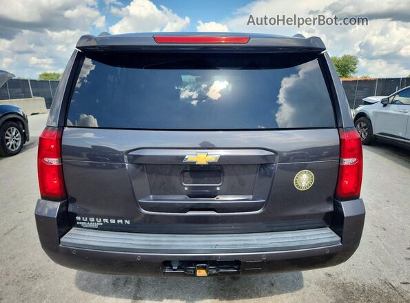 1GNSCHKC7JR257229 2018 CHEVROLET SUBURBAN Gray Вид ззаду