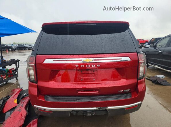 1GNSCNKD9NR306086 2022 CHEVROLET TAHOE Burgundy Հետևի տեսք