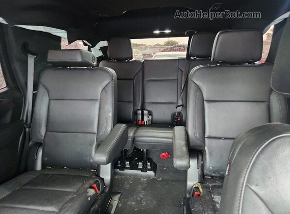 1GNSCNKD9NR306086 2022 CHEVROLET TAHOE Burgundy Հետևի նստատեղերի տեսք