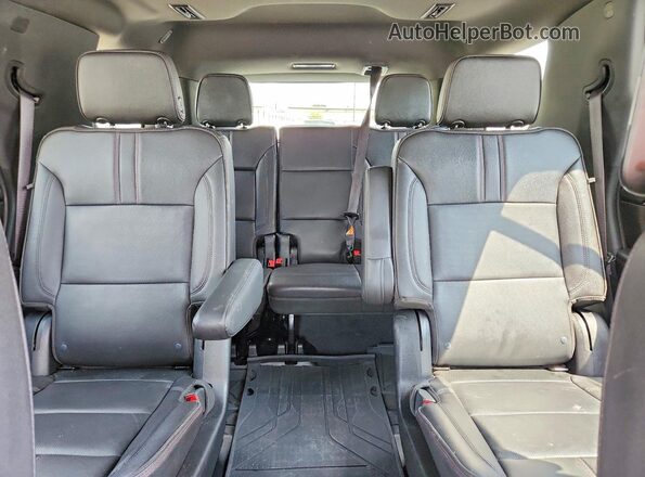 1GNSCRKD2PR428444 2023 CHEVROLET TAHOE White Rear seats view