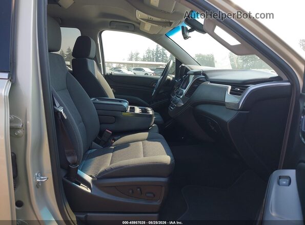 1GNSKAEC8HR313713 2017 CHEVROLET TAHOE Золотой Вид салона спереди