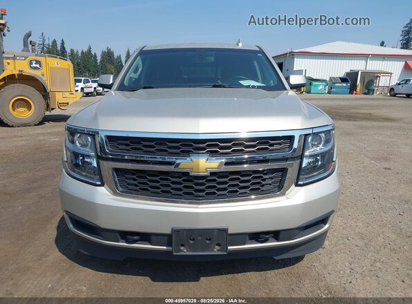1GNSKAEC8HR313713 2017 CHEVROLET TAHOE Золотой Вид щитка приборов