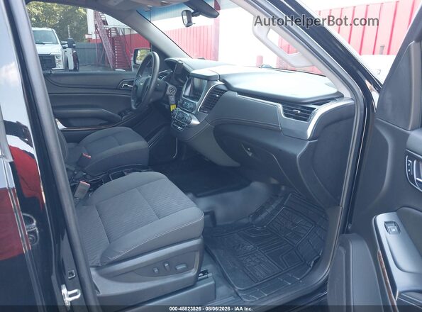 1GNSKEEC7JR286386 2018 CHEVROLET TAHOE Черный Вид салона спереди