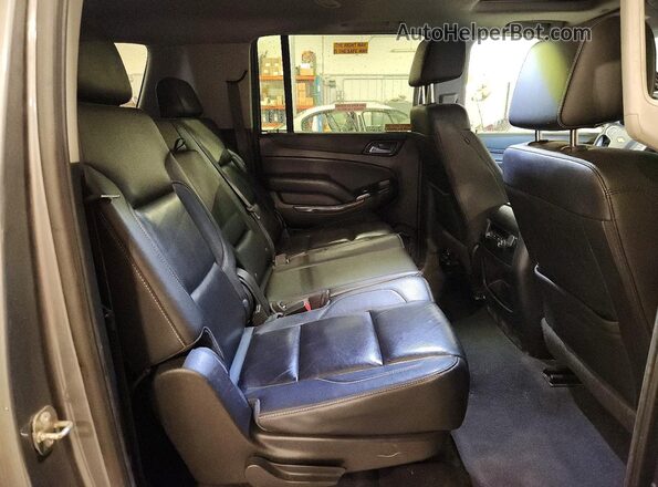 1GNSKHKC8LR254863 2020 CHEVROLET SUBURBAN Silver Вид задньої частини салону