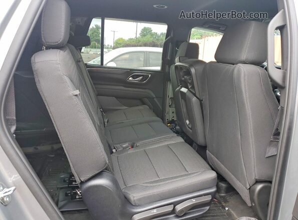 1GNSKLED1RR342153 2024 CHEVROLET TAHOE Silver Սալոնի հետևի տեսք