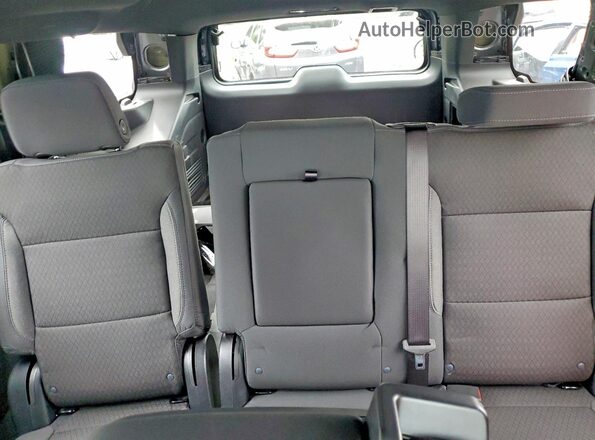 1GNSKLED1RR342153 2024 CHEVROLET TAHOE Silver Հետևի նստատեղերի տեսք