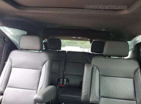 1GNSKNKD2PR155095 2023 CHEVROLET TAHOE Red უკანა სავარძლების ხედი