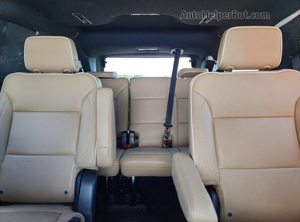 1GNSKSKD0PR226809 2023 CHEVROLET TAHOE White Rear seats view