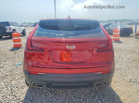 1GYAZAR40PF217023 2023 CADILLAC XT4 Red Widok z tyłu