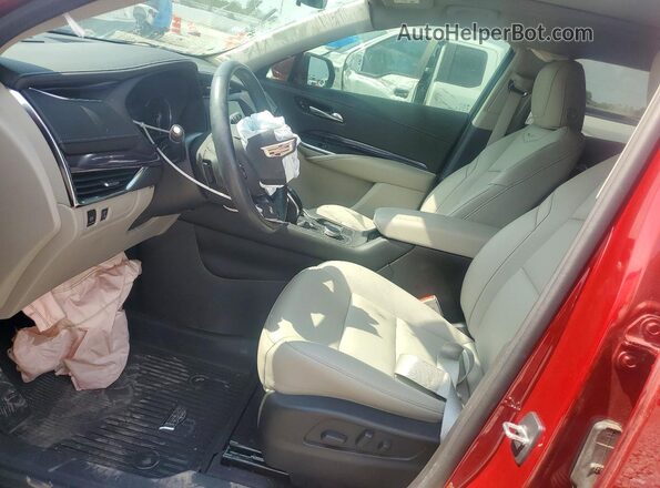 1GYAZAR40PF217023 2023 CADILLAC XT4 Red Widok wnętrza z przodu