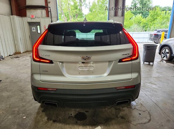 1GYFZBR44NF109254 2022 CADILLAC XT4 Silver Vista trasera