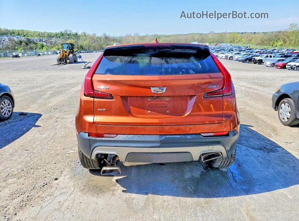 1GYFZDR45MF003793 2021 CADILLAC XT4 Orange უკანა ხედი