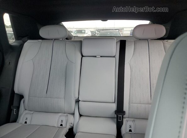 1GYKPYRKXSZ310964 2025 CADILLAC OTHER Red Vista de los asientos traseros