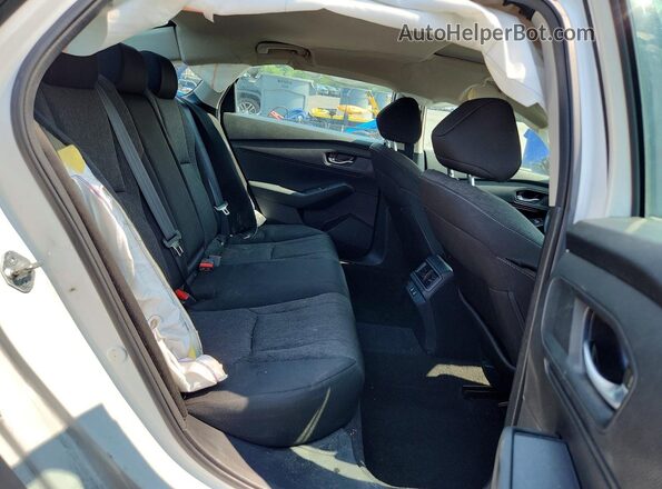 1HGCY1F43SA004404 2025 HONDA ACCORD White Rear seats view