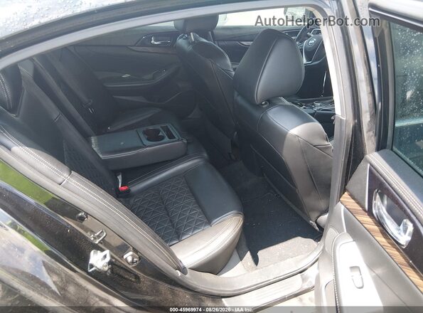 1N4AA6AP1GC384157 2016 NISSAN MAXIMA Black Vista de la etiqueta del VIN