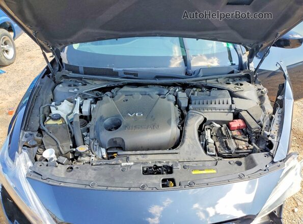 1N4AA6AP4HC389970 2017 NISSAN MAXIMA Charcoal Widok wnętrza z tyłu