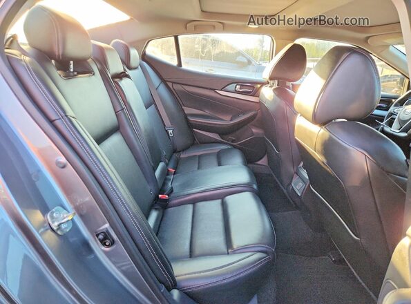 1N4AA6AP7JC406542 2018 NISSAN MAXIMA Gray Vista de los asientos traseros