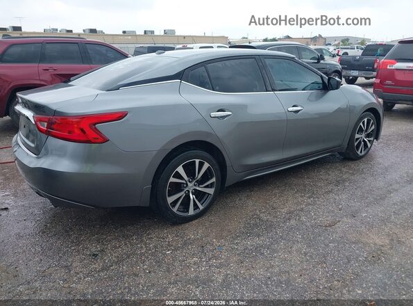 1N4AA6AP8GC409409 2016 NISSAN MAXIMA Gray Trasero derecho