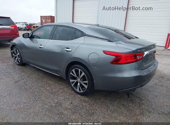 1N4AA6AP8GC409409 2016 NISSAN MAXIMA Gray Trasero izquierdo
