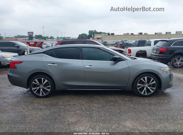 1N4AA6AP8GC409409 2016 NISSAN MAXIMA Gray Vista interior trasera