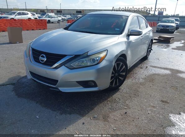 1N4AL3AP6JC248946 2018 NISSAN ALTIMA Silver წინა მარცხენა ხედი სამი მეოთხედიდან