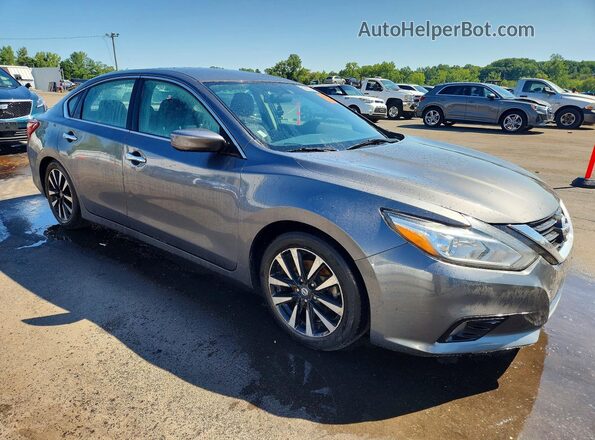 1N4AL3AP7JC130923 2018 NISSAN ALTIMA Gray Delantero derecho