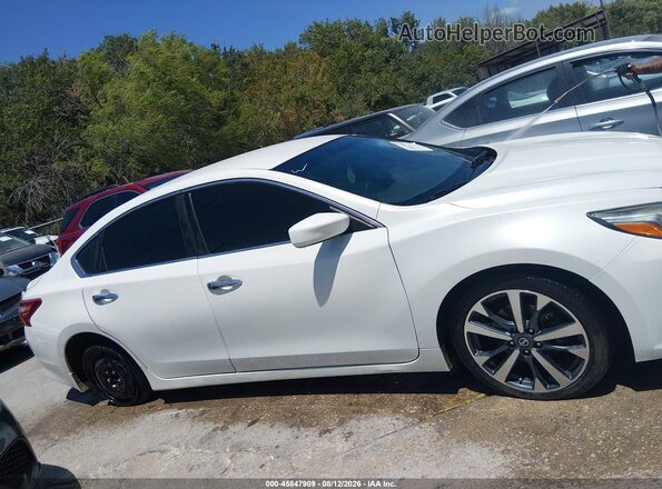 1N4AL3APXGN323984 2016 NISSAN ALTIMA Cream Вид задньої частини салону