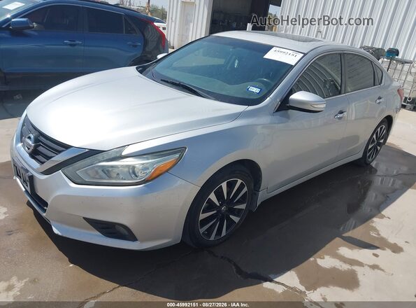 1N4AL3APXJC190047 2018 NISSAN ALTIMA Silver Przód lewy