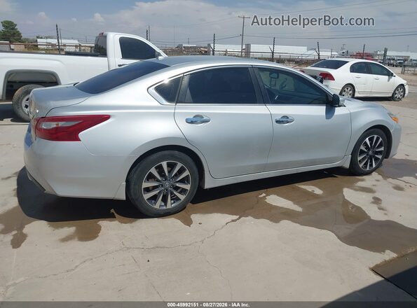 1N4AL3APXJC190047 2018 NISSAN ALTIMA Silver Widok wnętrza z tyłu