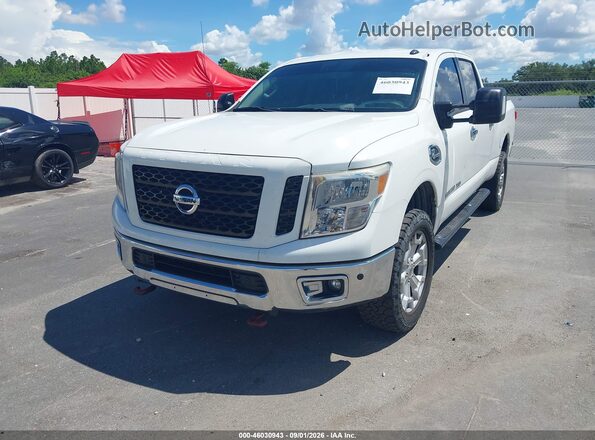 1N6BA1F41KN510012 2019 NISSAN TITAN XD White Vista tres cuartos delantera izquierda