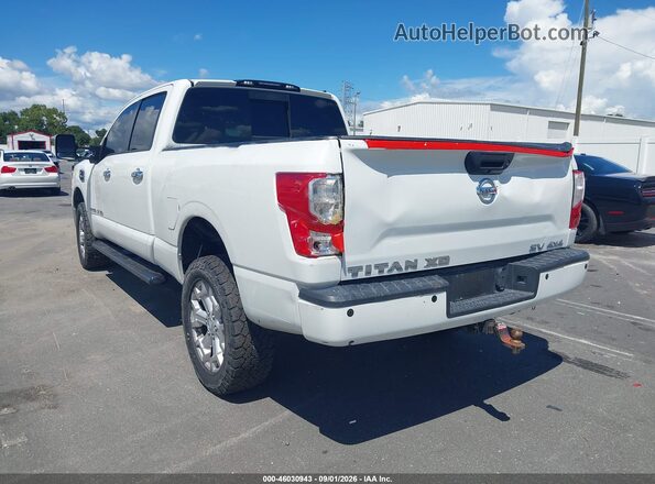 1N6BA1F41KN510012 2019 NISSAN TITAN XD White Trasero izquierdo
