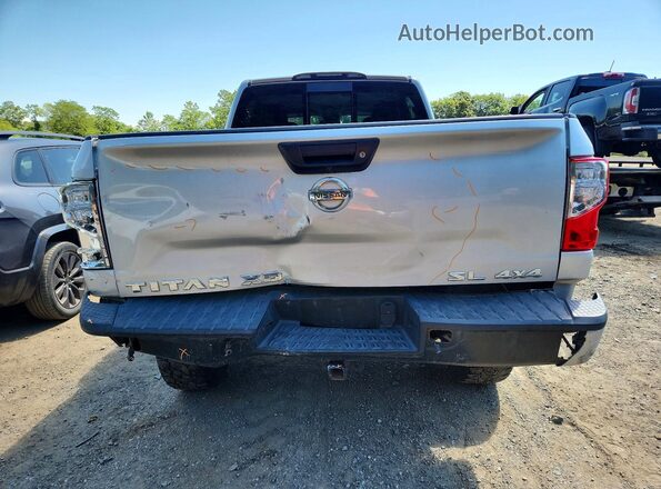 1N6BA1F43GN508348 2016 NISSAN TITAN Серебряный Вид сзади